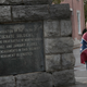 A white nationalist demonstrator stands next to a Confederate war memorial as he waits for the start of a rally on Oct. 28, 2017, in Murfreesboro, Tenn. (Scott Olson/Getty Images)